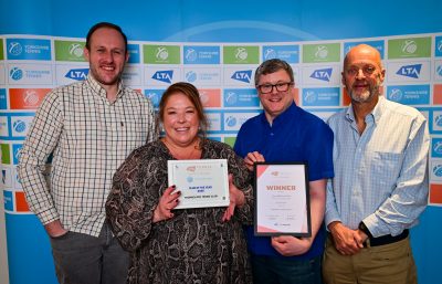Group of people receiving award