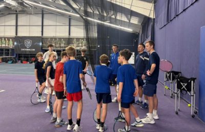 Group of boys on tennis court